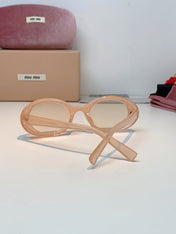 MIUMIU 26S OVAL FRAME IN ACETATE 424527