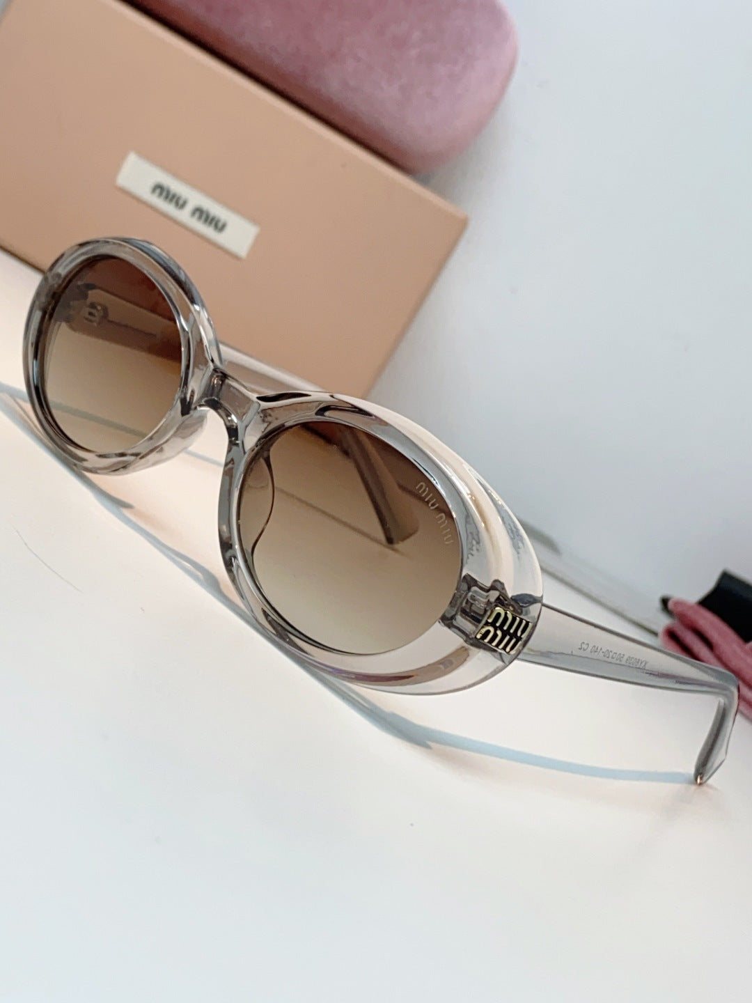 MIUMIU 26S OVAL FRAME IN ACETATE 424528