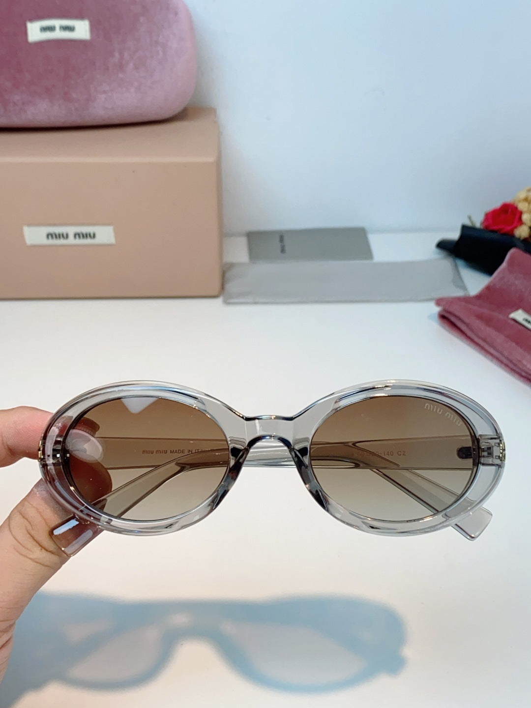 MIUMIU 26S OVAL FRAME IN ACETATE 424528