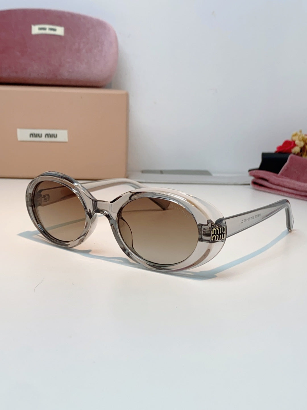 MIUMIU 26S OVAL FRAME IN ACETATE 424528