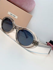 MIUMIU 26S OVAL FRAME IN ACETATE 424529