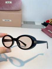 MIUMIU 26S OVAL FRAME IN ACETATE 424530