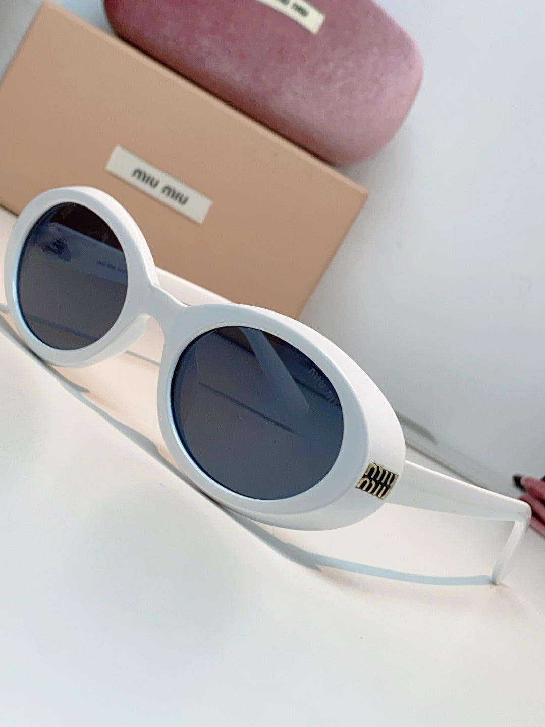MIUMIU 26S OVAL FRAME IN ACETATE 424531