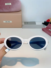 MIUMIU 26S OVAL FRAME IN ACETATE 424531
