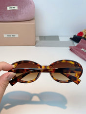 MIUMIU 26S OVAL FRAME IN ACETATE 424532