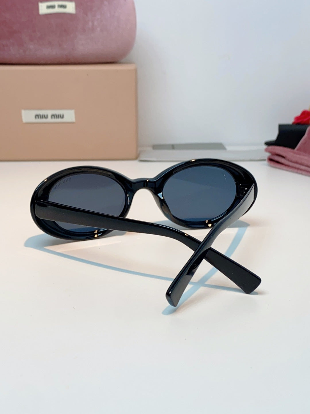 MIUMIU 26S OVAL FRAME IN ACETATE 424533