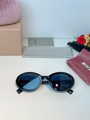 MIUMIU 26S OVAL FRAME IN ACETATE 424533