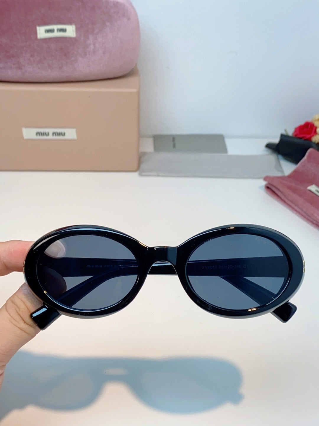MIUMIU 26S OVAL FRAME IN ACETATE 424533