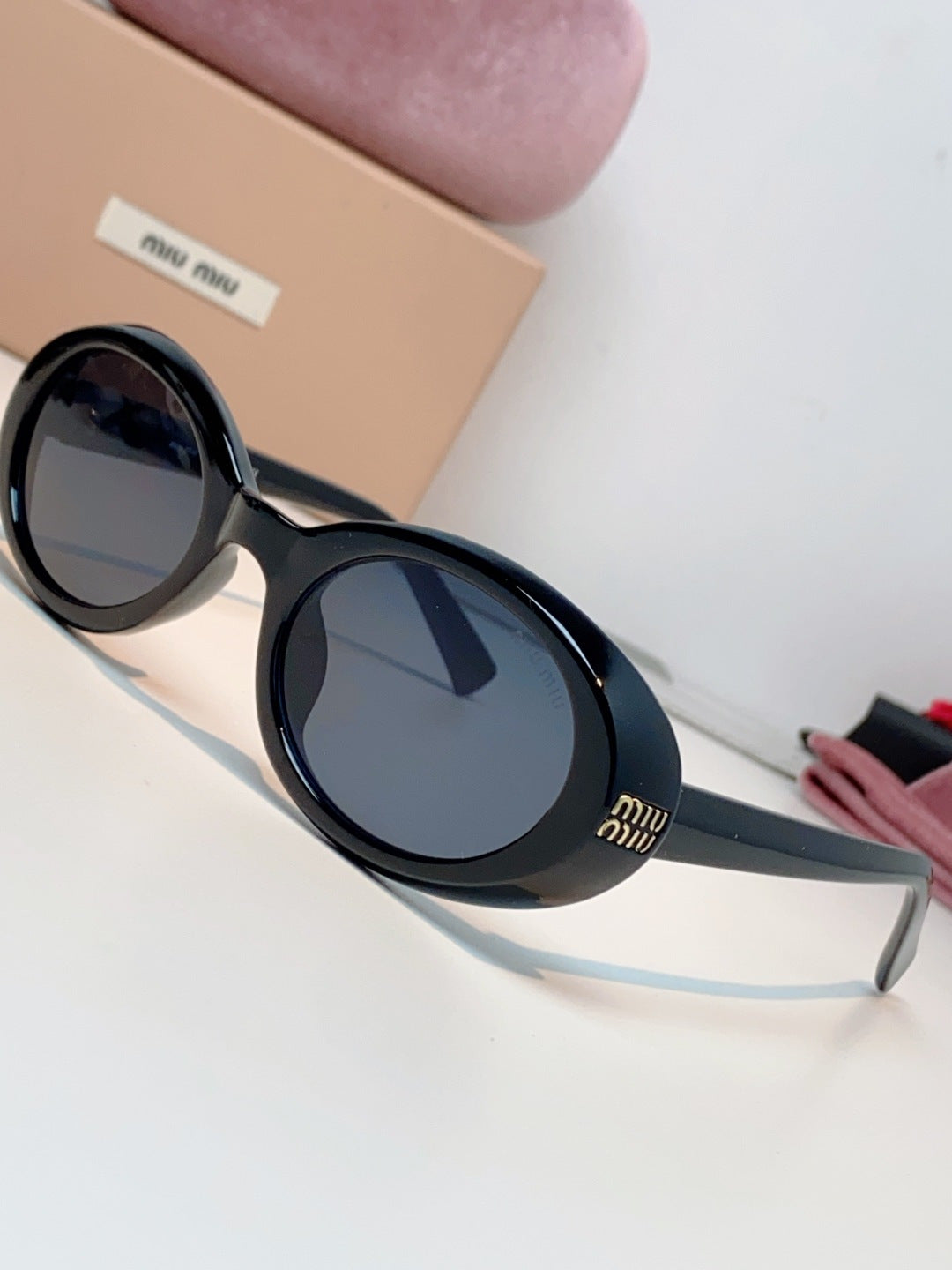 MIUMIU 26S OVAL FRAME IN ACETATE 424533