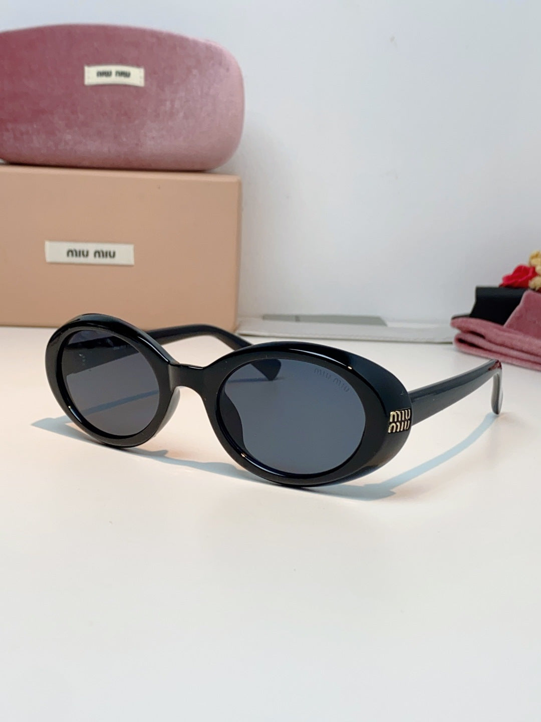 MIUMIU 26S OVAL FRAME IN ACETATE 424533