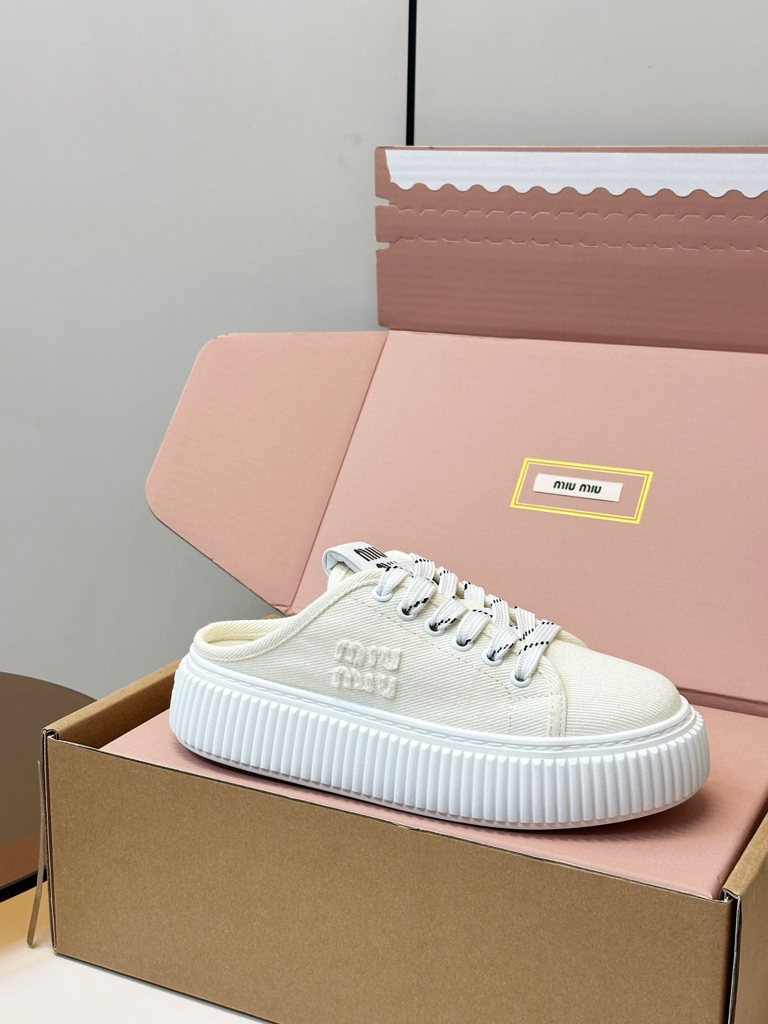 MIUMIU 26S SNEAKER MULES IN LIGHT YELLOW CANVAS