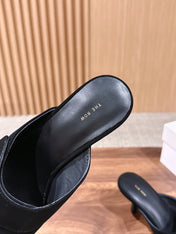 THE ROW 26S BUTTON DETAIL MULE SANDALS IN BLACK SUEDE