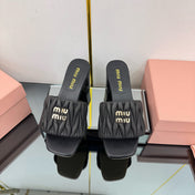 MATELASSÉ SLIDES PUMP IN BLACK CALFSKIN