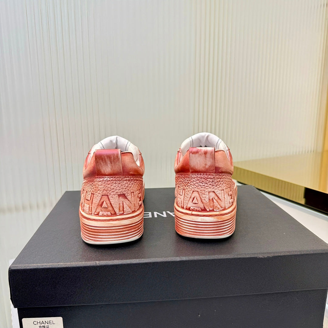CHANEL 26S LOW-TOP SNEAKERS IN LIGHT CORAL PINK CALFSKIN