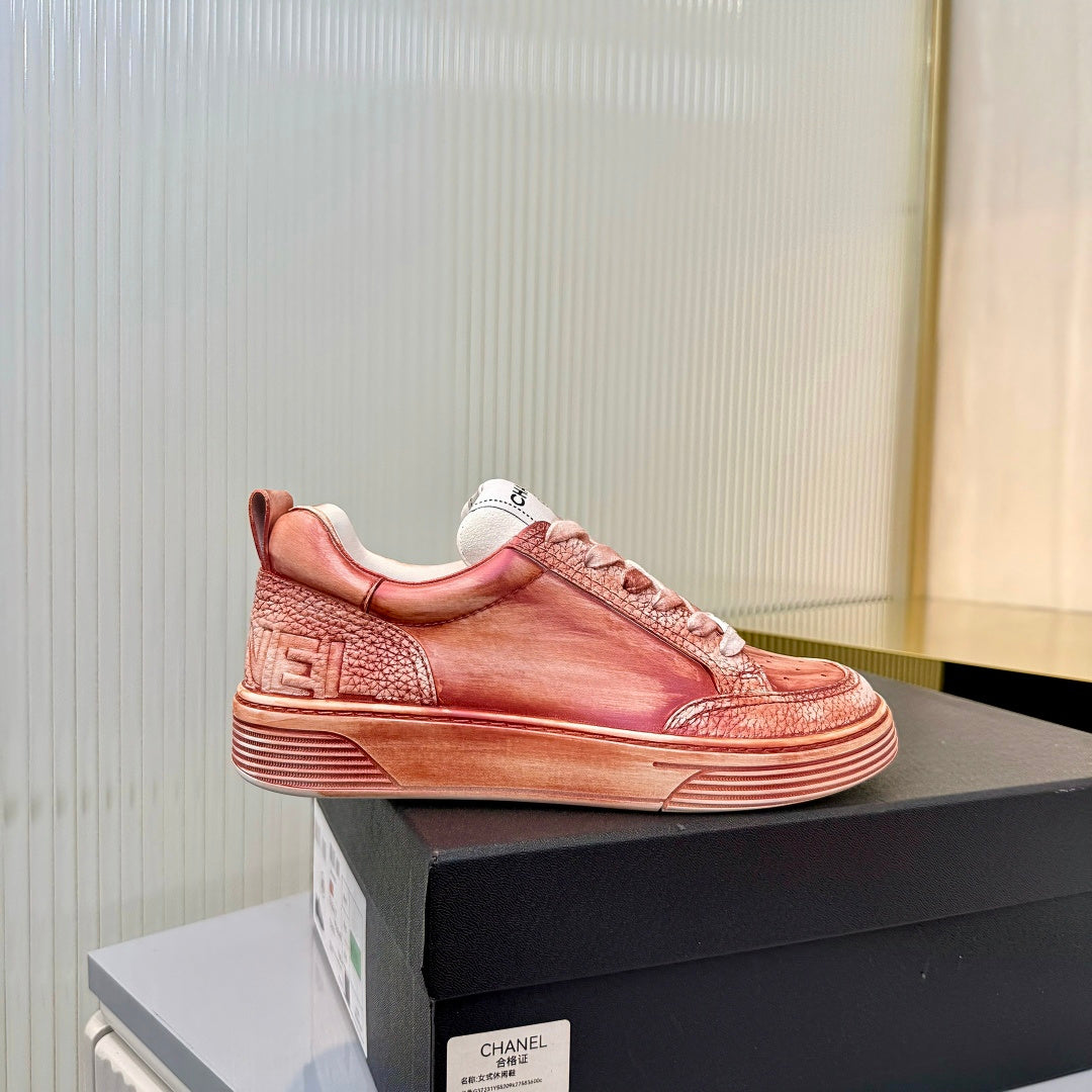 CHANEL 26S LOW-TOP SNEAKERS IN LIGHT CORAL PINK CALFSKIN