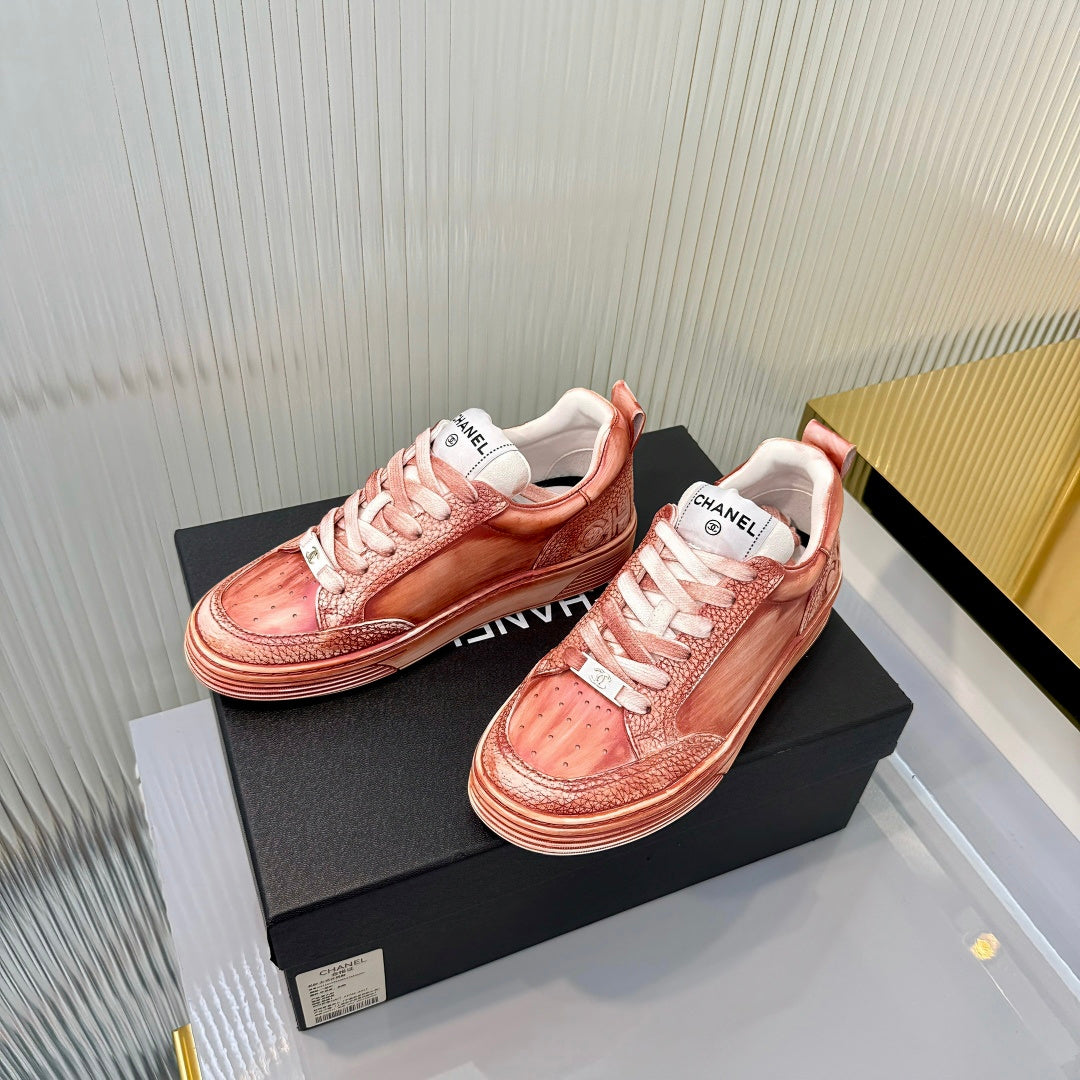 CHANEL 26S LOW-TOP SNEAKERS IN LIGHT CORAL PINK CALFSKIN