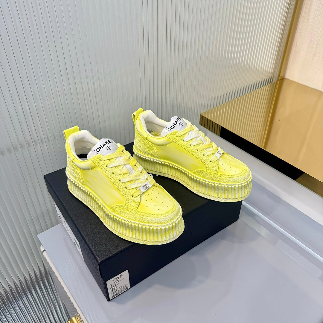 CHANEL 26S LOW-TOP SNEAKERS IN LIGHT YELLOW GRAFFITI PATTERN CALFSKIN