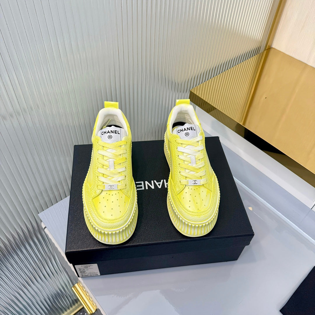 CHANEL 26S LOW-TOP SNEAKERS IN LIGHT YELLOW GRAFFITI PATTERN CALFSKIN