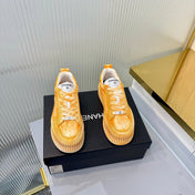 CHANEL 26S LOW-TOP SNEAKERS IN GOLDEN ORANGE GRAFFITI PATTERN CALFSKIN