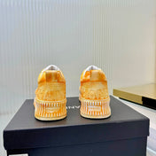 CHANEL 26S LOW-TOP SNEAKERS IN GOLDEN ORANGE GRAFFITI PATTERN CALFSKIN