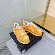 CHANEL 26S LOW-TOP SNEAKERS IN GOLDEN ORANGE GRAFFITI PATTERN CALFSKIN