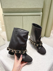 CHANEL 25S CALF-LENGTH BOOTS 45MM IN BLACK CALFSKIN GOLD HARDWARE