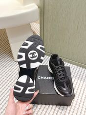 CHANEL 25S LUXURY SNEAKERS IN BLACK CALFSKIN AND SUEDE