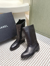 CHANEL 25S MID-CALF BOOTS IN BLACK CALFSKIN