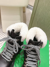 BOTTEGA VENETA 26S LUG ANKLE BOOTS IN BLACK CALFSKIN AND WHITE WOOL