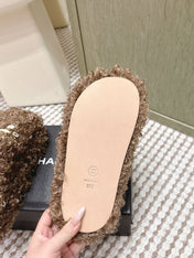 CHANEL 25S CLASSIC FURRY SLIDES IN BROWN WITH DOUBLE C LOGO