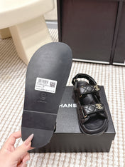 CHANEL 26S QUILTED DAD SANDALS IN BLACK CALFSKIN