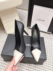 CHANEL 26S HIGH HEELS IN BLACK LAMBSKIN WITH WHITE CHEVRON-QUILTED TOE