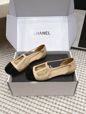 CHANEL 26S ROUND TOE MARY JANE FLATS IN OFF BEIGE CUTOUT CALFSKIN WITH BLACK PATENT TOE