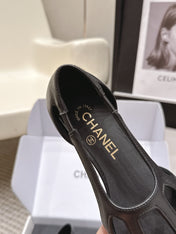 CHANEL 26S ROUND TOE MARY JANE FLATS IN BLACK CUTOUT CALFSKIN