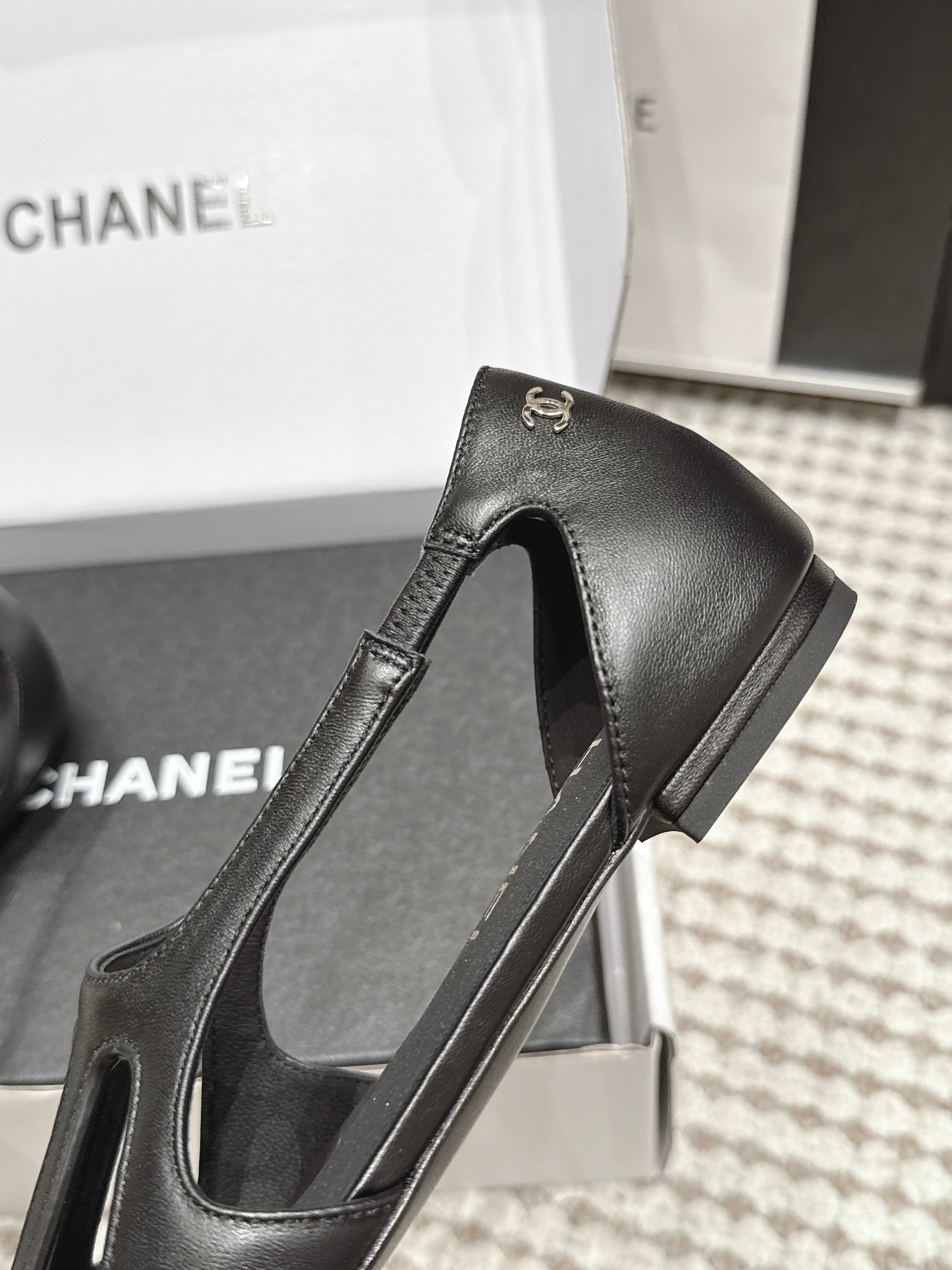 CHANEL 26S ROUND TOE MARY JANE FLATS IN BLACK CUTOUT CALFSKIN
