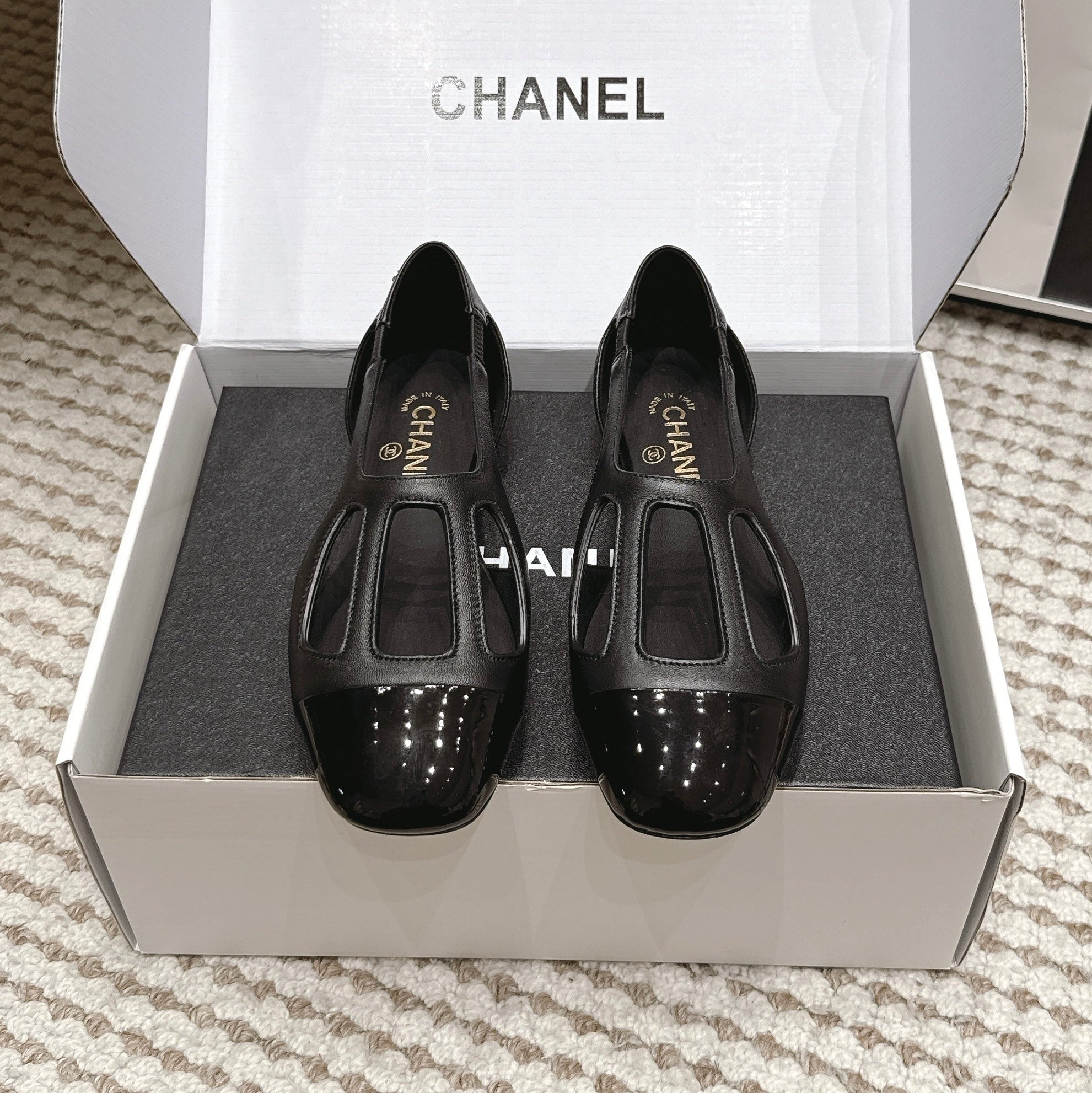 CHANEL 26S ROUND TOE MARY JANE FLATS IN BLACK CUTOUT CALFSKIN