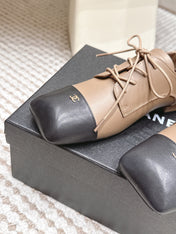CHANEL 26S LACE-UP OXFORD SHOES IN LIGHT BROWN CALFSKIN WITH BLACK TOE CAP