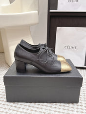 CHANEL 26S LACE-UP OXFORD HEELS IN BLACK CALFSKIN WITH GOLD TOE CAP