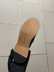 BOTTEGA VENETA 26S BACKLESS LOAFERS IN BLACK TECHNICAL WOVEN CALFSKIN