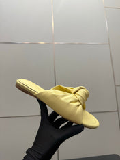 BOTTEGA VENETA 26S SLIDE SANDALS IN YELLOW LAMBSKIN