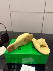 BOTTEGA VENETA 26S SLIDE SANDALS IN YELLOW LAMBSKIN