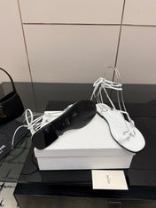 CELINE 26S TRIOMPHE LACE UP FLAT SANDALS IN WHITE CALFSKIN