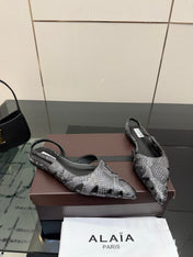 ALAIA 26S CUT-OUT SLINGBACK FLATS IN BLACK PYTHON-EMBOSSED LEATHER