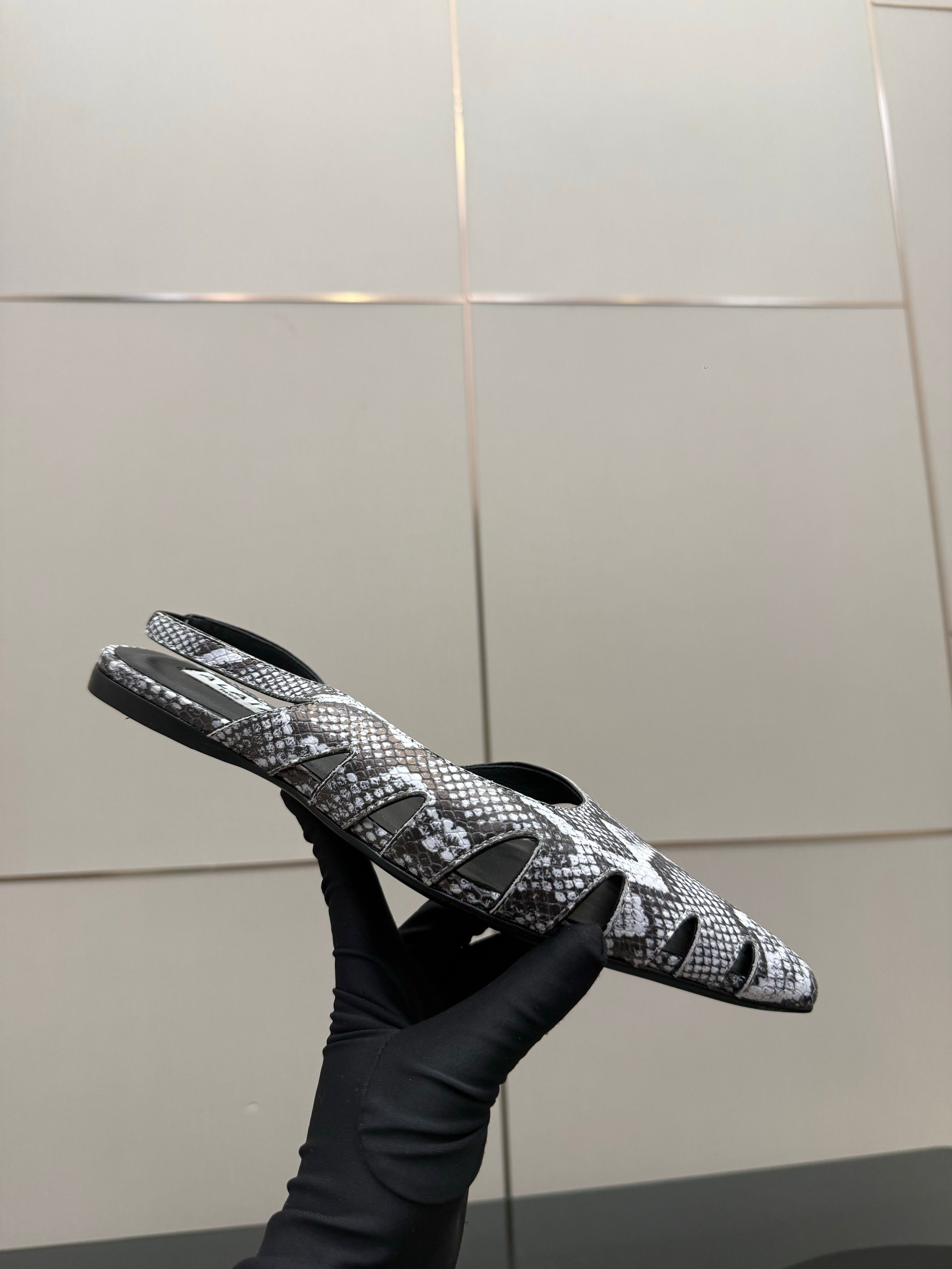 ALAIA 26S CUT-OUT SLINGBACK FLATS IN PYTHON-EMBOSSED LEATHER