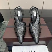 ALAIA 26S HEELED SLINGBACKS IN BLACK CROC-EMBOSSED LEATHER