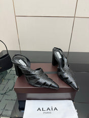 ALAIA 26S HEELED SLINGBACKS IN BLACK CROC-EMBOSSED LEATHER