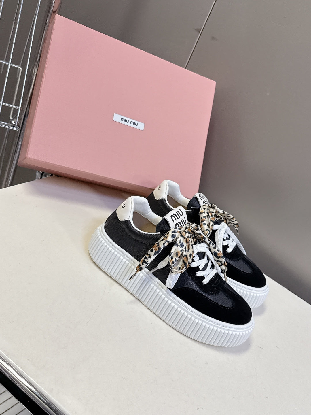 MIUMIU 25S SNEAKERS 45MM IN BLACK SUEDE WITH LEOPARD-PRINT LACES