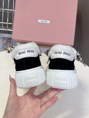 MIUMIU 25S SNEAKERS 45MM IN BLACK SUEDE WITH LEOPARD-PRINT LACES SHEARLING