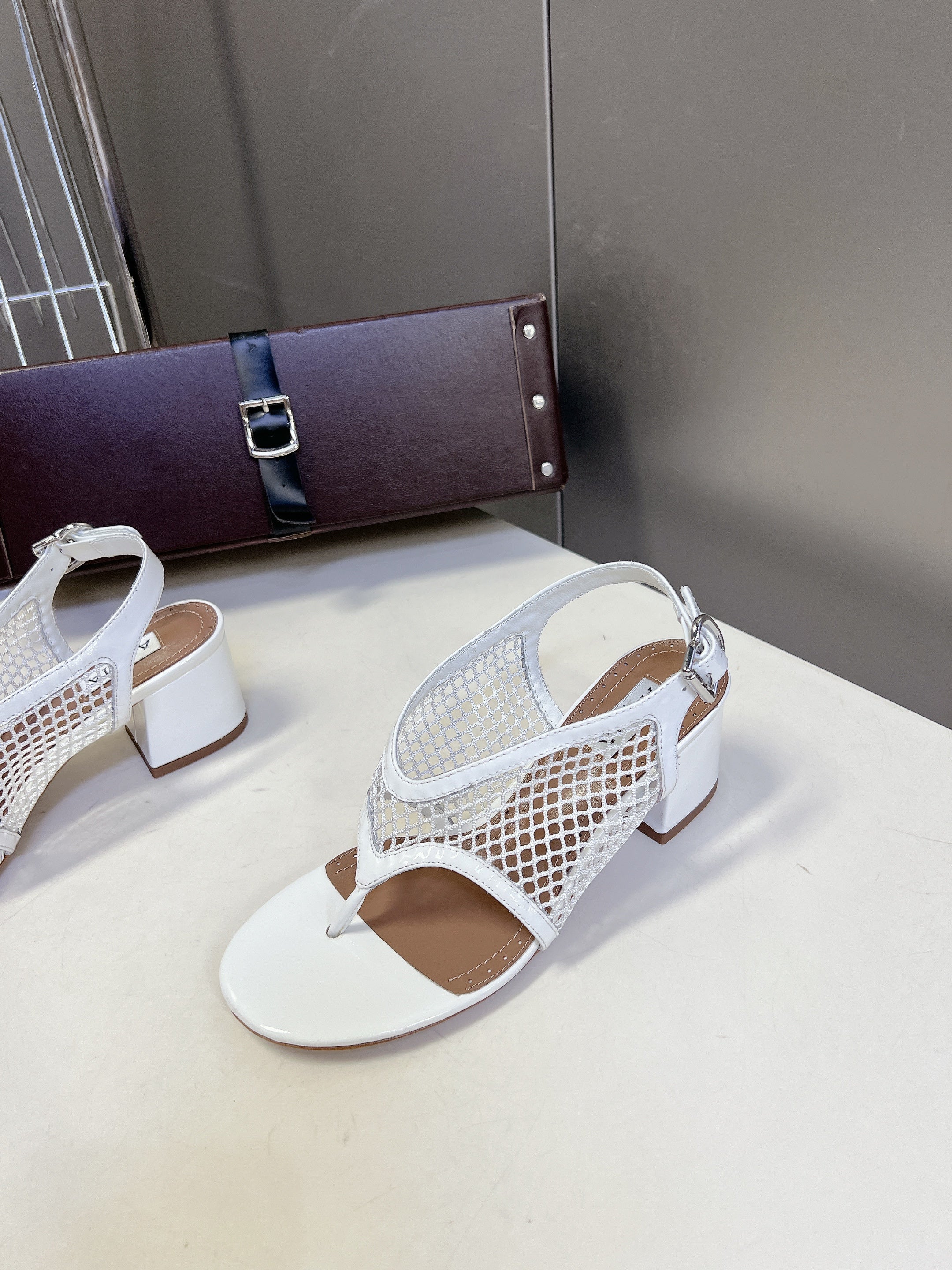 ALAIA 26S MESH THONG HEELS 55 MM IN WHITE PATENT CALFSKIN