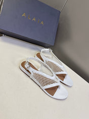 ALAIA 26S FLAT MESH THONG SANDALS IN WHITE PATENT CALFSKIN